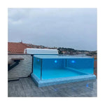 Piscina al aire libre sobre el suelo de tamaño completo los mejores diseños suelo duradero vidrio transparente Panel de piscinas de contenedores de natación sin fin