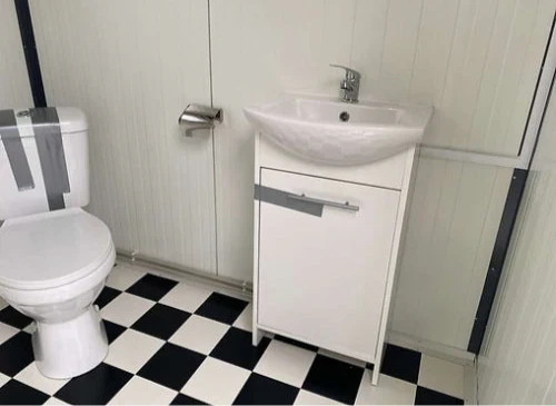 Contenedor sanitario 4X2M inodoro doble con duchas