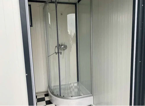 Contenedor sanitario 4X2M inodoro doble con duchas