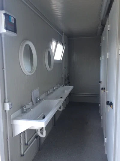 RECIPIENTE CON DUCHAS (DIM. 6.00 LOS X 2.40 M)